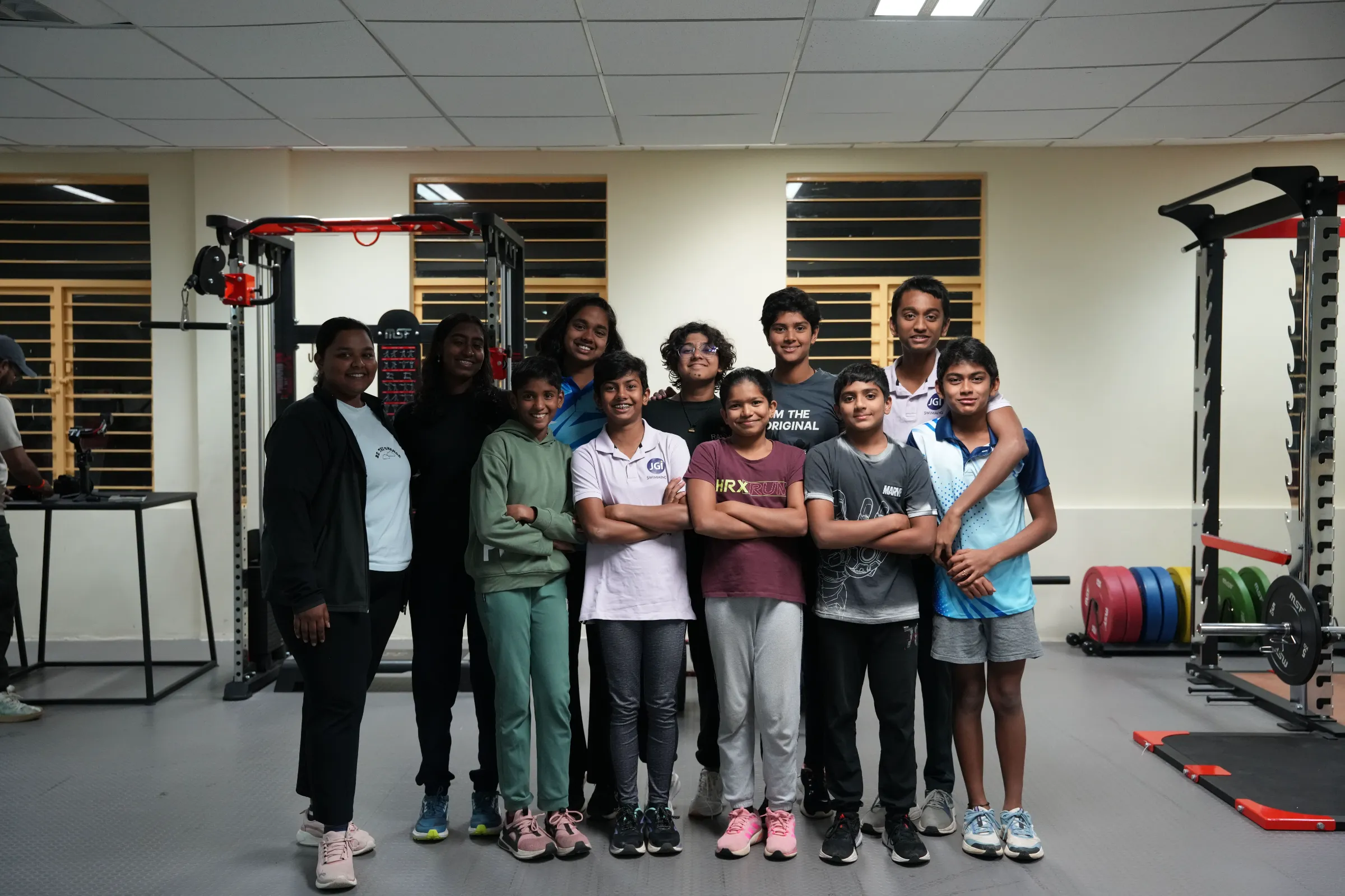 Young JAIN Sports athletes in the strength and conditioning gym