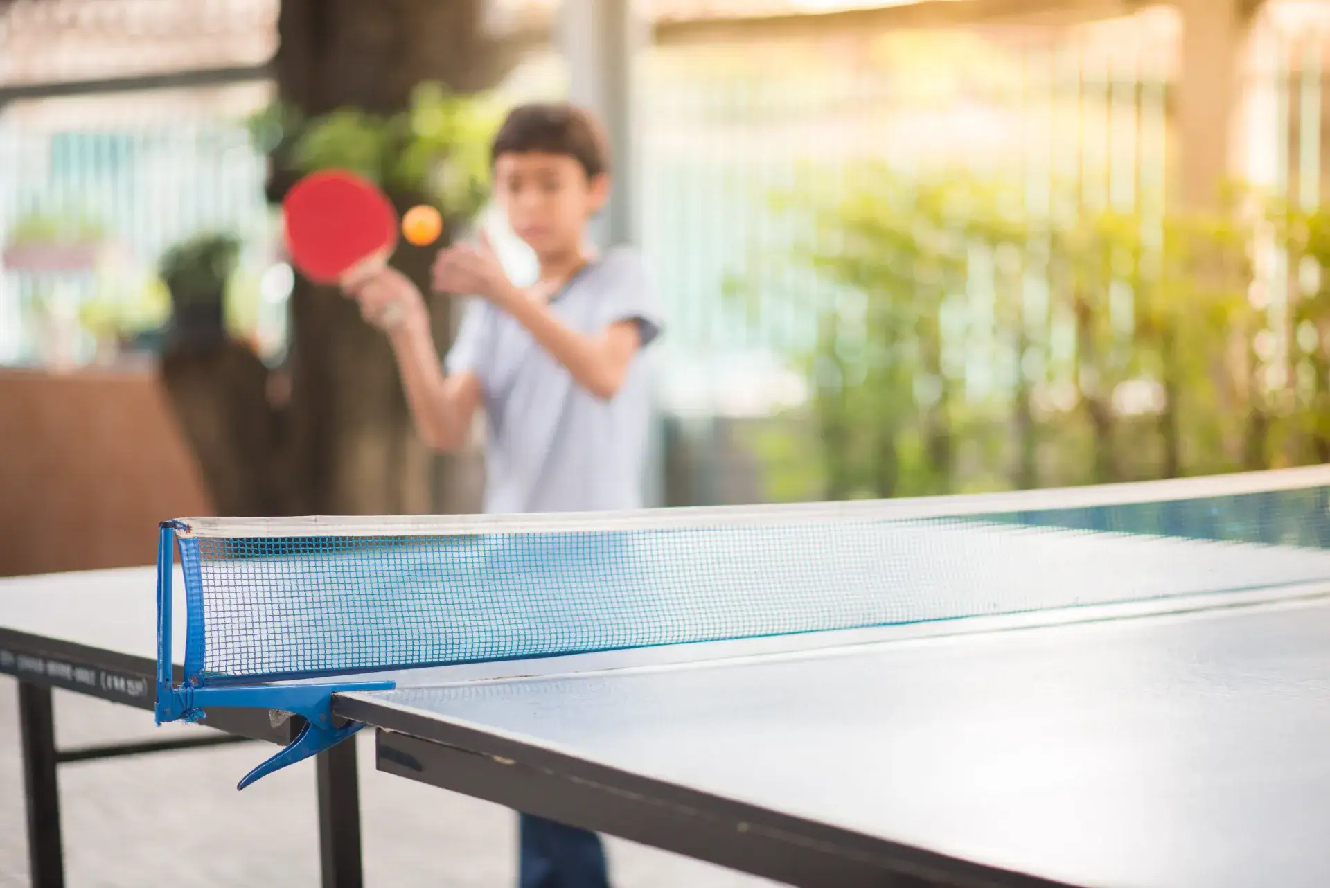 Young player in a table tennis rally